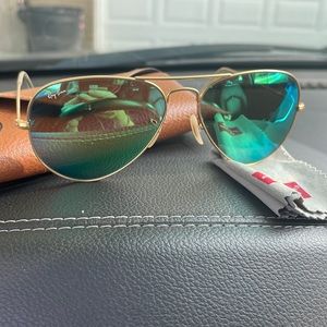 Never worn with box and dust cloth. Ray bay bright neon green shades.